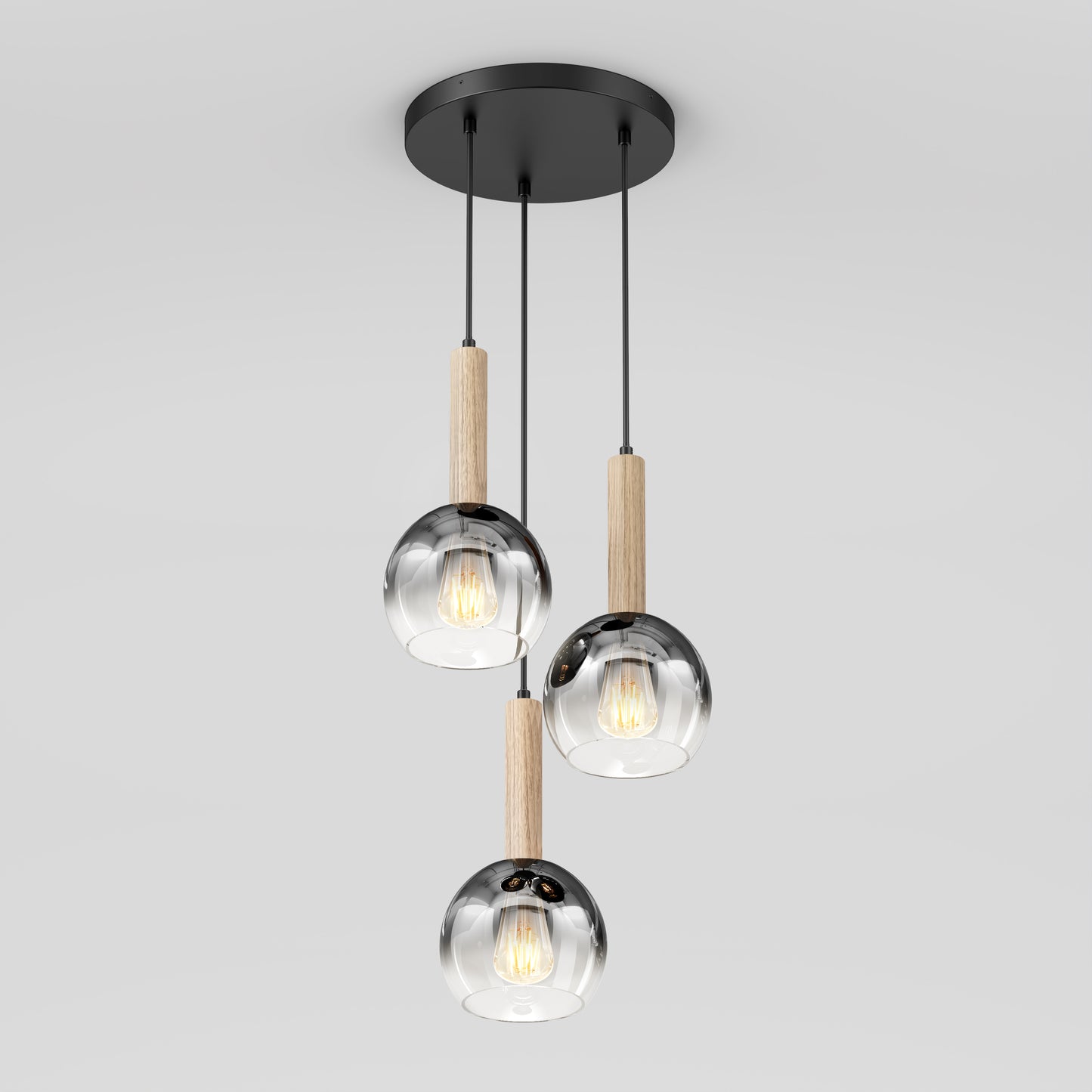 The Artika Ardel Spiral 3-Light Pendant features three glass globes, each hanging from a black mount by black cords with wooden accents above each, and is sold without bulbs.