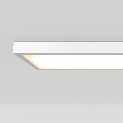The Artika Skyshade smart RGB LED light panel, featuring a rectangular white frame, is mounted on a plain white ceiling, creating a clean and minimalist modern look.