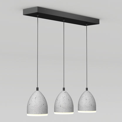 The Artika Bergen 3-light LED pendant features three modern gray concrete dome shades suspended in a row from a sleek black rectangular ceiling mount, shown against a plain white background.