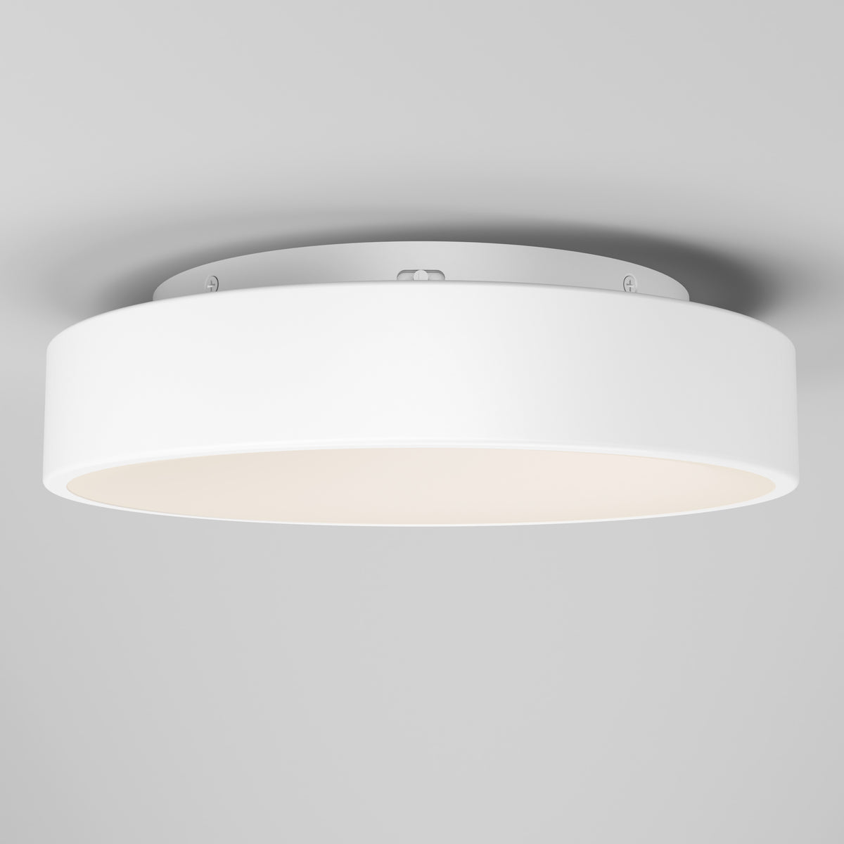 The Artika Aiden LED flush mount is a modern, round white ceiling light with a smooth, minimalist design. Mounted on a light-colored ceiling, it emits a soft, even glow.