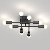 Modern ceiling light fixture with six evenly spaced glowing bulbs on black metal rods, arranged in a geometric pattern, mounted on a white ceiling.