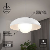 A modern white pendant lamp with a round LED light hangs from the ceiling. Text highlights its adjustable height, steel with white finish, energy efficiency, integrated LED, and a 3-year warranty. A plant sits below.