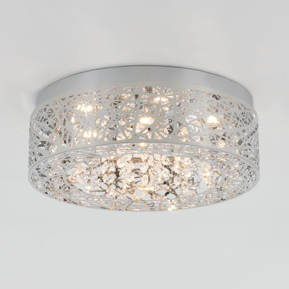 The Artika Crystal Nest LED flush mount is a modern ceiling light featuring a silver geometric lattice and hanging crystal accents, illuminated by multiple small bulbs.