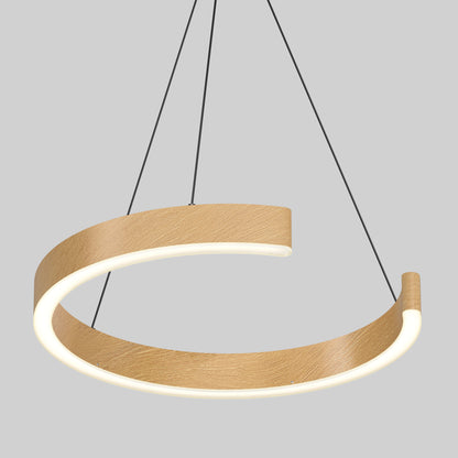The Vance modern LED pendant light 3 CCT by Artika features a crescent-shaped wooden design with an integrated LED strip, suspended by three thin black cables against a plain gray background.
