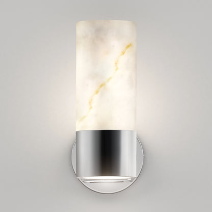 The Artika Marble LED contemporary sconce 5 CCT features a cylindrical white alabaster shade with subtle gold veining, mounted on a round polished chrome base, adding modern style to any light grey wall.
