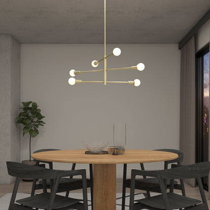 A modern dining room with a round wooden table, four black chairs, a potted plant, a large window showing a city view at dusk, and the Artika Aristo LED 5 CCT pendant light as an elegant centerpiece.