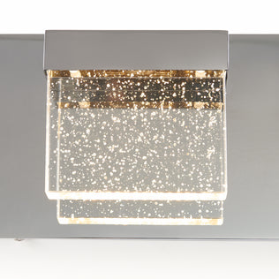 The Artika Bubble Cube 4-light LED vanity light features clear bubbly glass shades and a metallic base for a warm, modern glow.