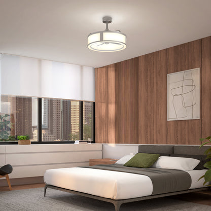 Modern bedroom with a low platform bed, green and white bedding, wood-paneled accent wall, abstract artwork, large window showing city buildings, and an Artika Huxley 23 in. LED modern ceiling fan with 3 speeds.