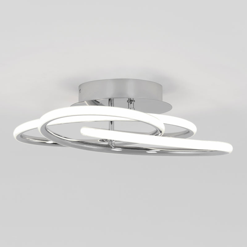 The Artika Swirl Butterfly LED contemporary flush mount light features a circular chrome base with intertwined glowing loops in a minimalist design. This dimmable ceiling fixture offers stylish, adjustable illumination.