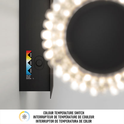 A close-up top view of the Artika Exalto LED bathroom vanity light features a glowing circular bulb cluster and a color temperature switch labeled Warm, Neutral, White. Below is Colour Temperature Switch in three languages.