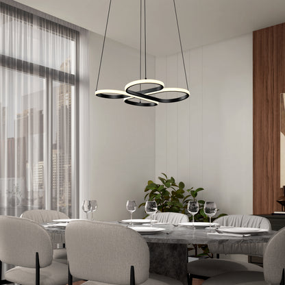 A modern dining room with a marble table set for six, gray upholstered chairs, a sculptural LED chandelier, large windows with sheer curtains, a green plant, and wooden panel accents on the wall.