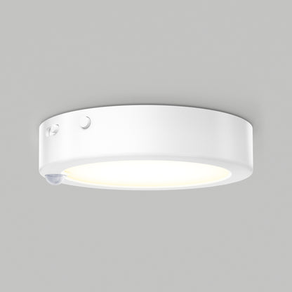 The Artika Accent under cabinet LED light 3CCT features a smooth, white finish, a side button, and a discreet motion sensor, casting a gentle glow against a light gray background.