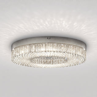 Artika FM Lysara 15 in. LED Fashion Flush Mount Ceiling Light 5 CCT with a textured crystal-like border that casts a patterned glow on the ceiling.