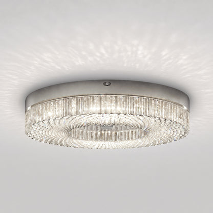 Artika FM Lysara 15 in. LED Fashion Flush Mount Ceiling Light 5 CCT with a textured crystal-like border that casts a patterned glow on the ceiling.