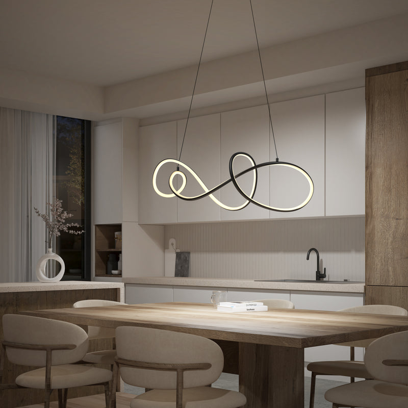 Modern kitchen and dining area featuring a wooden table, beige cushioned chairs, minimalist white cabinets, a black faucet, and the Siena modern LED pendant light by Artika hanging above the table.