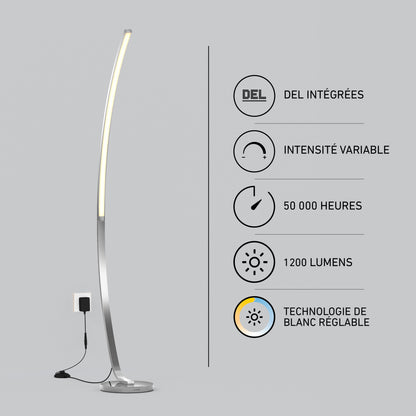 The Artika Arc LED Floor Lamp stands by a wall outlet. French icons highlight its features: dimmable, 50,000-hour lifespan, 1200 lumens, and adjustable white LED technology.