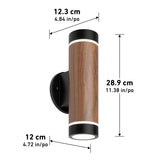 Wall-mounted cylindrical light fixture with wood finish and black accents, shown with measurements: height 28.9 cm (11.38 in), width 12.3 cm (4.84 in), and wall plate diameter 12 cm (4.72 in).