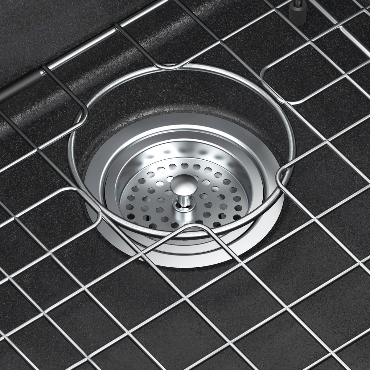Close-up of Artika’s Baycrest 31 in. Modern Sink drain with removable strainer and grid rack above the black drain opening.
