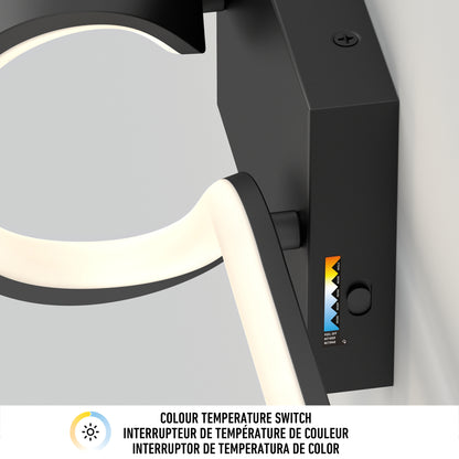 Close-up of the Artika Bowtie modern LED bathroom vanity light 5 CCT, featuring a colour temperature switch with cool-to-warm scale and button. Bilingual text reads COLOUR TEMPERATURE SWITCH in English and French.