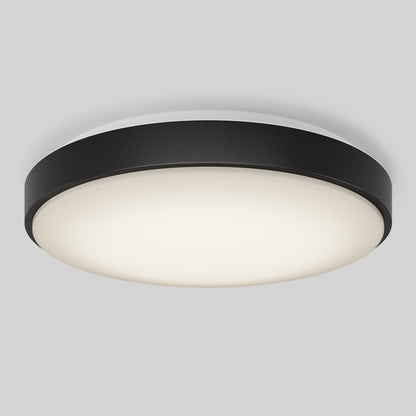 The Artika Sunraker 10 in. LED modern flush mount light features a black outer rim and white frosted diffuser, delivering sleek style when installed on a light gray ceiling.