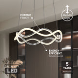 Modern LED chandelier with wavy, chrome-finished light fixture, suspended from the ceiling by cables. Features include adjustable height, energy efficiency (no bulbs required), and a 5-year warranty. Shelves and decor in the background.