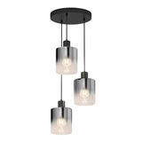A modern ceiling light fixture with three hanging pendant bulbs, each covered by a cylindrical glass shade that transitions from black at the top to clear at the bottom. The fixture is mounted on a round black base.