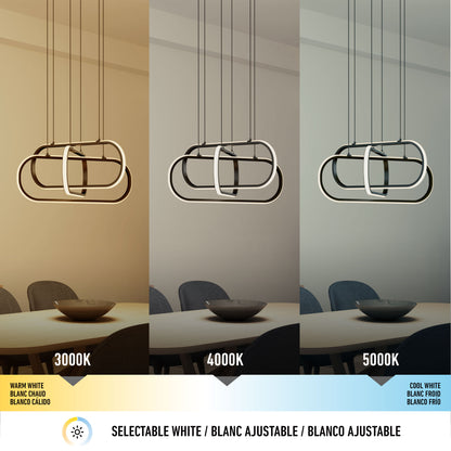 The Artika Lewis modern LED pendant light 3 CCT is displayed above a dining table, showcasing selectable color temperatures—warm white (3000K), neutral white (4000K), and cool white (5000K)—with an adjustable slider below.