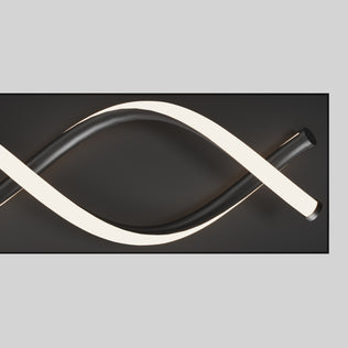 The Artika DNA modern LED bathroom vanity light features two wave-like tubes, one white and one black, on a dark rectangular base.