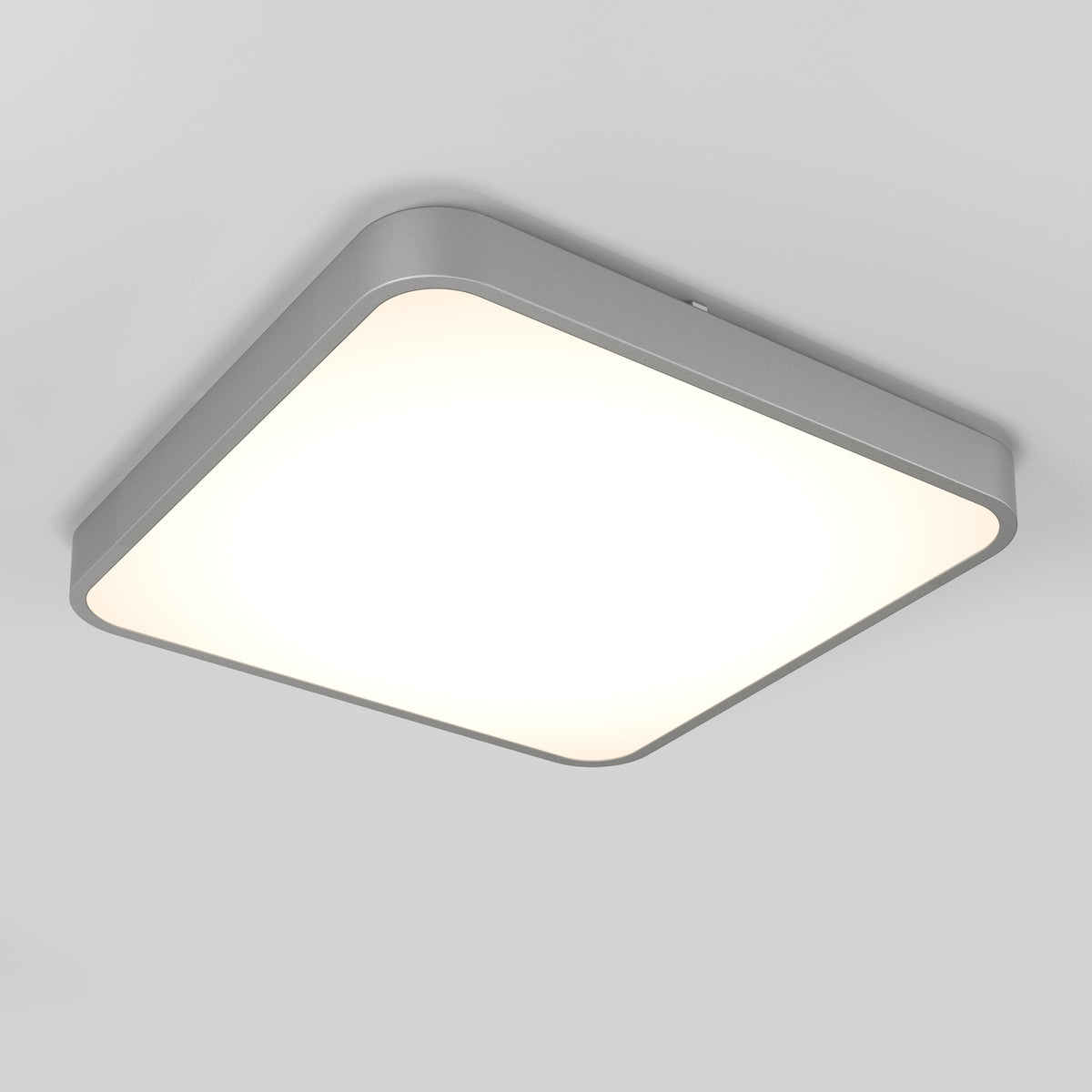 The Artika Europa 18 in. LED flush mount light features a modern, square design with rounded corners, a matte gray frame, and a diffused white panel. It includes a remote and is designed for seamless installation on plain white ceilings.