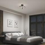 A modern bedroom with a dark upholstered bed, white and gray bedding, two abstract art pieces on the wall, large windows with black blinds, and a sculptural black ceiling light fixture.