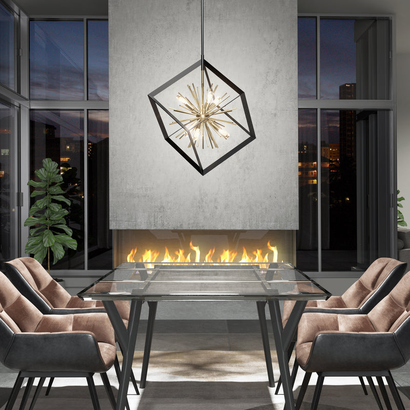 A modern dining room features four cushioned chairs around a glass table, the Artika Nebula 6-light pendant overhead, a linear fireplace in a concrete wall, and large windows with views of the city at dusk.