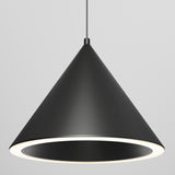 A modern, black, cone-shaped pendant light hangs from the ceiling. The light has a smooth matte finish and emits a soft glow from its circular inner rim, against a plain light gray background.