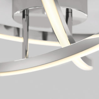Close-up of the Artika Orly modern LED flush mount light with adjustable color and chrome finish against a light gray background.