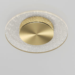 The Artika Essence Disk LED flush mount is a modern ceiling light featuring a circular gold center and a translucent outer ring with tiny glowing lights, installed on a plain white ceiling.
