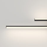 Two minimalist, horizontal LED light bars mounted on a plain white wall, emitting soft, white light and creating a clean, modern look. One light is longer and placed lower than the shorter, upper light.