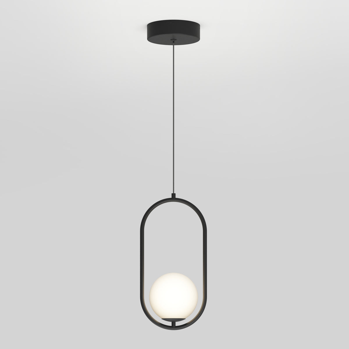 A modern pendant light with a black circular base, a thin black cord, and an oval-shaped metal frame holding a glowing white spherical bulb at the bottom, set against a plain light gray background.