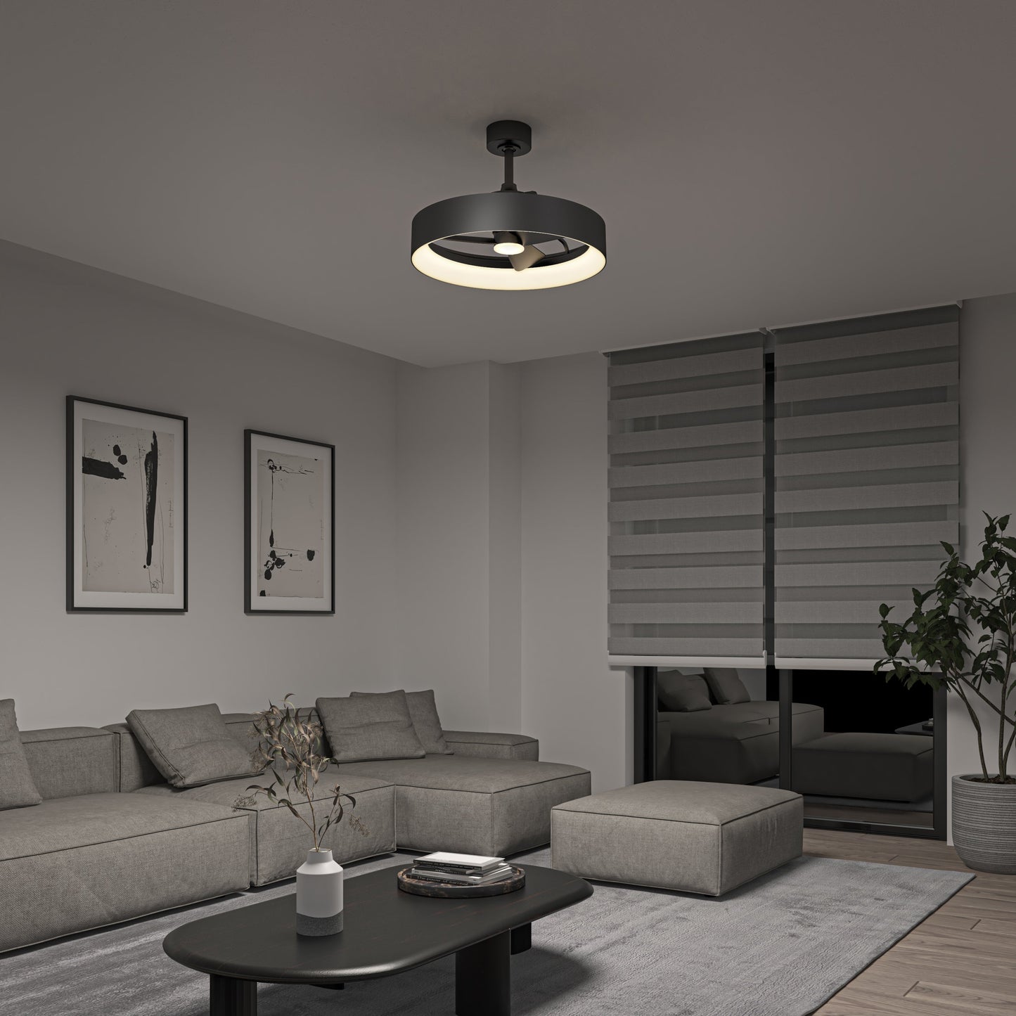 A modern living room featuring a gray sectional sofa, low black coffee table, abstract wall art, large window with layered blinds, a potted plant, and the Artika-CAN-dev Austin 23 in. LED modern ceiling fan with remote lighting the space.