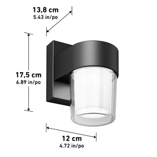 The Artika Halden indoor-outdoor LED wall light 5 CCT features a modern black cylindrical design with a clear glass shade. Dimensions: height 17.5 cm (6.89"), width 13.8 cm (5.43"), depth 12 cm (4.72").