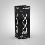 Black product box featuring the Artika Swirl LED table lamp, with images of the lamp’s modern twisted design and product details displayed on the packaging.