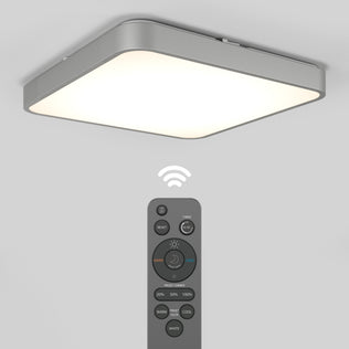 The Artika Europa 18 in. LED flush mount light is shown lit, with a remote below it featuring buttons to adjust brightness and color temperature. A wireless icon indicates the remote can control the light.