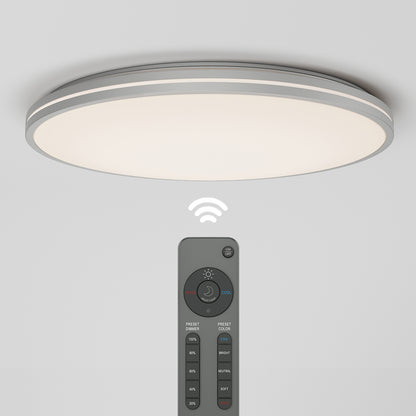 The Artika Athos 21 in. LED flush mount light features a modern round design and emits a soft white glow. It includes a remote for wireless control of brightness and color temperature settings.