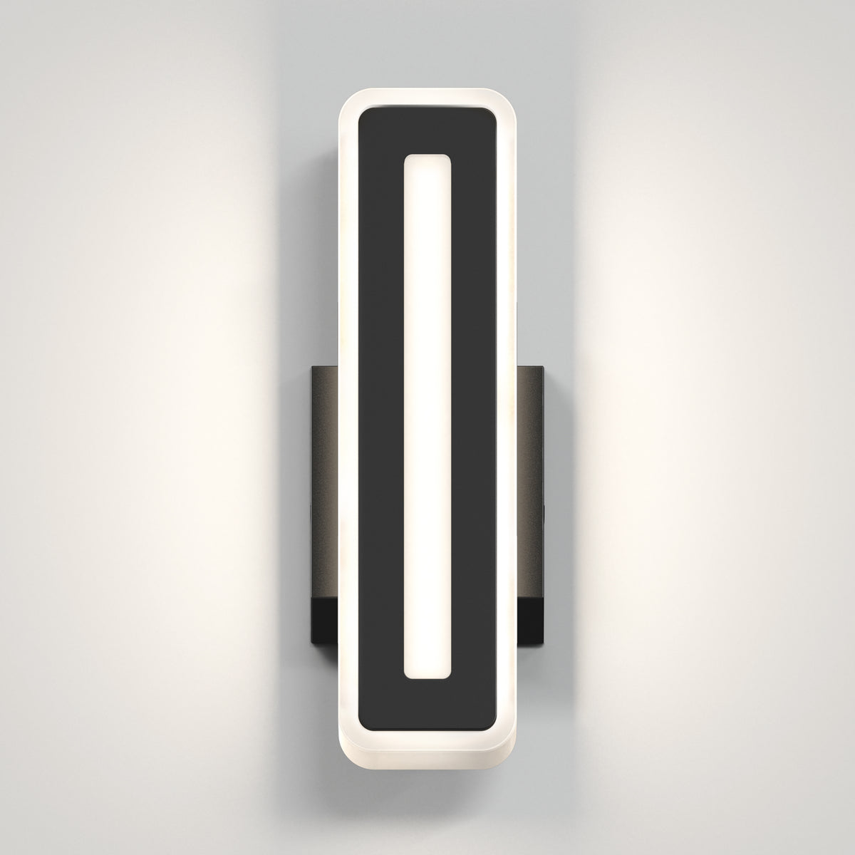 A modern, rectangular wall sconce with a black frame and a white illuminated border, mounted on a light gray wall. The light creates a soft glow on both sides of the fixture.