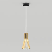 The Artika Kiyo modern LED pendant 3 CCT features a black ceiling mount and a cylindrical wooden slat shade, suspended by a slim black cord against a plain light gray background.