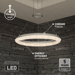 The Artika Famous Optical LED pendant light 5 CCT features a chrome finish, adjustable height, energy-efficient integrated LEDs (no bulbs needed), and comes with a 5-year warranty—ideal for rooms with dark stone walls.