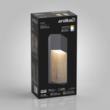 A black Artika-branded packaging box displays the Howel LED wall light with a wood-like design, product details, features, energy rating, and icons showing specifications on the front.