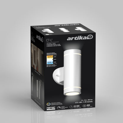 A black box packaging for the Artika C7 indoor-outdoor LED wall light 3 CCT, showing an image of the white cylindrical fixture along with details on brightness, lifespan, and energy efficiency.