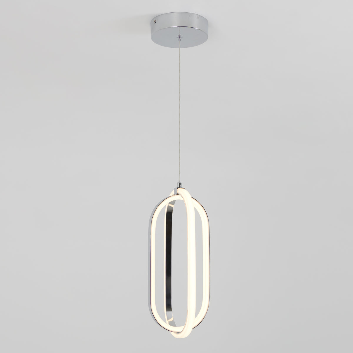The Artika Arlo 1-light LED pendant features a modern oval-shaped design and hangs from a silver ceiling mount against a plain white background.