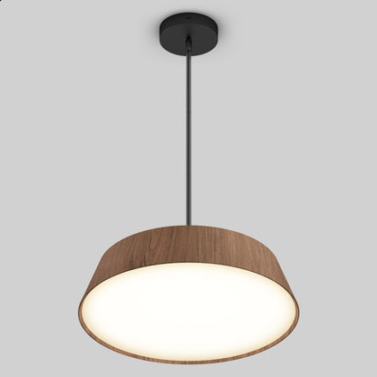 The Artika Dunham LED Pendant 5 CCT features a modern design with a black ceiling mount, slim black rod, and wide wood-textured shade encircling a glowing circular light, shown against a plain gray background.