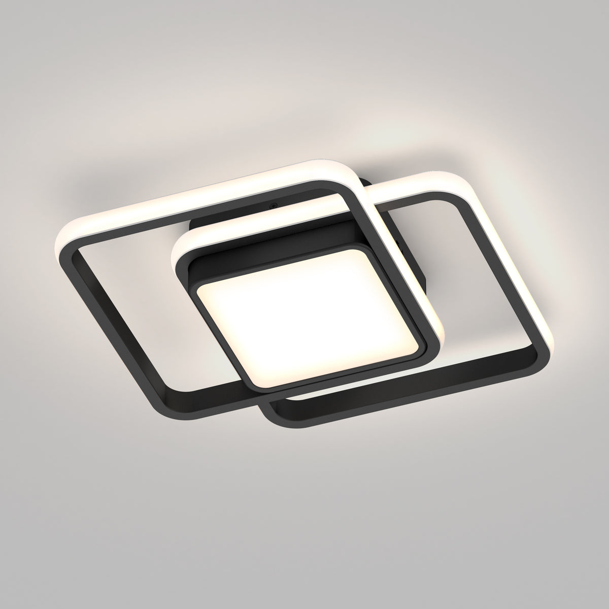 The Artika Romeson 11 in. LED modern flush mount light features a central illuminated square and two overlapping black square frames with glowing edges, adding style and soft white light to any room. 5 selectable CCTs included.