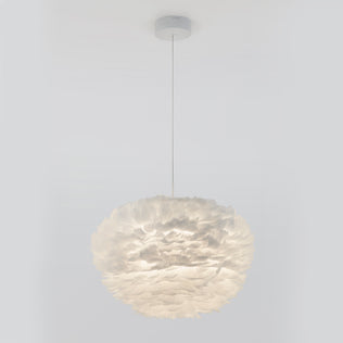 The Artika Plume LED pendant light features a spherical shade crafted from layered, feather-like white material and hangs elegantly from the ceiling by a thin cord against a plain white background.